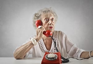 Older women on rotary dial phone